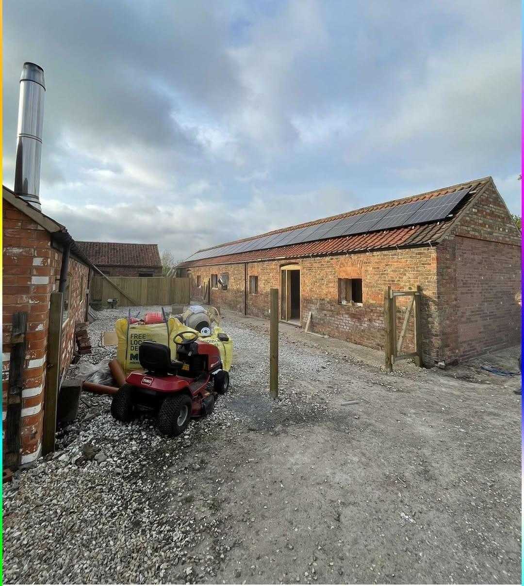 Solar panels installed on a converted barn roof